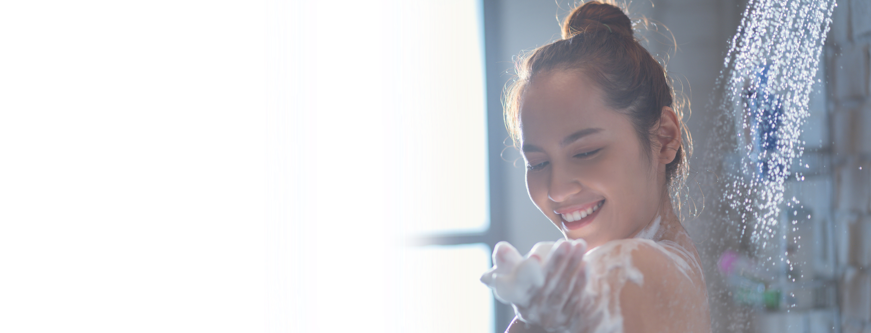 Woman enjoying filtered shower water